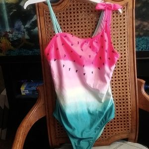 Little girl's bathing suit size 10/12 (used)